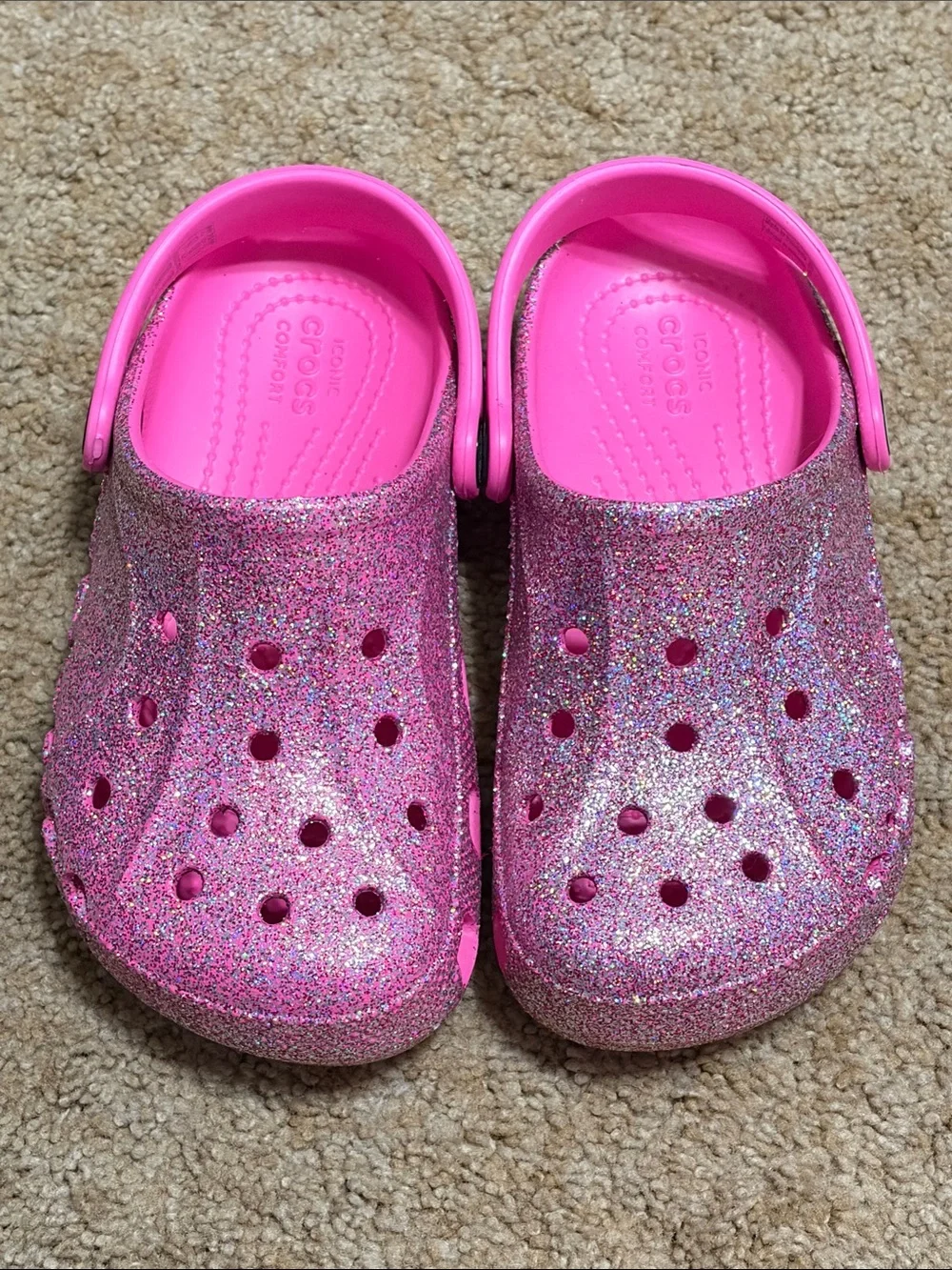 Never worn CROCS Kids Glitter Pink Clogs with Heel Strap